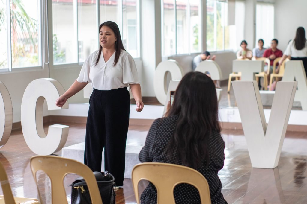 A student in a one-on-one voice lesson with an Octave coach.