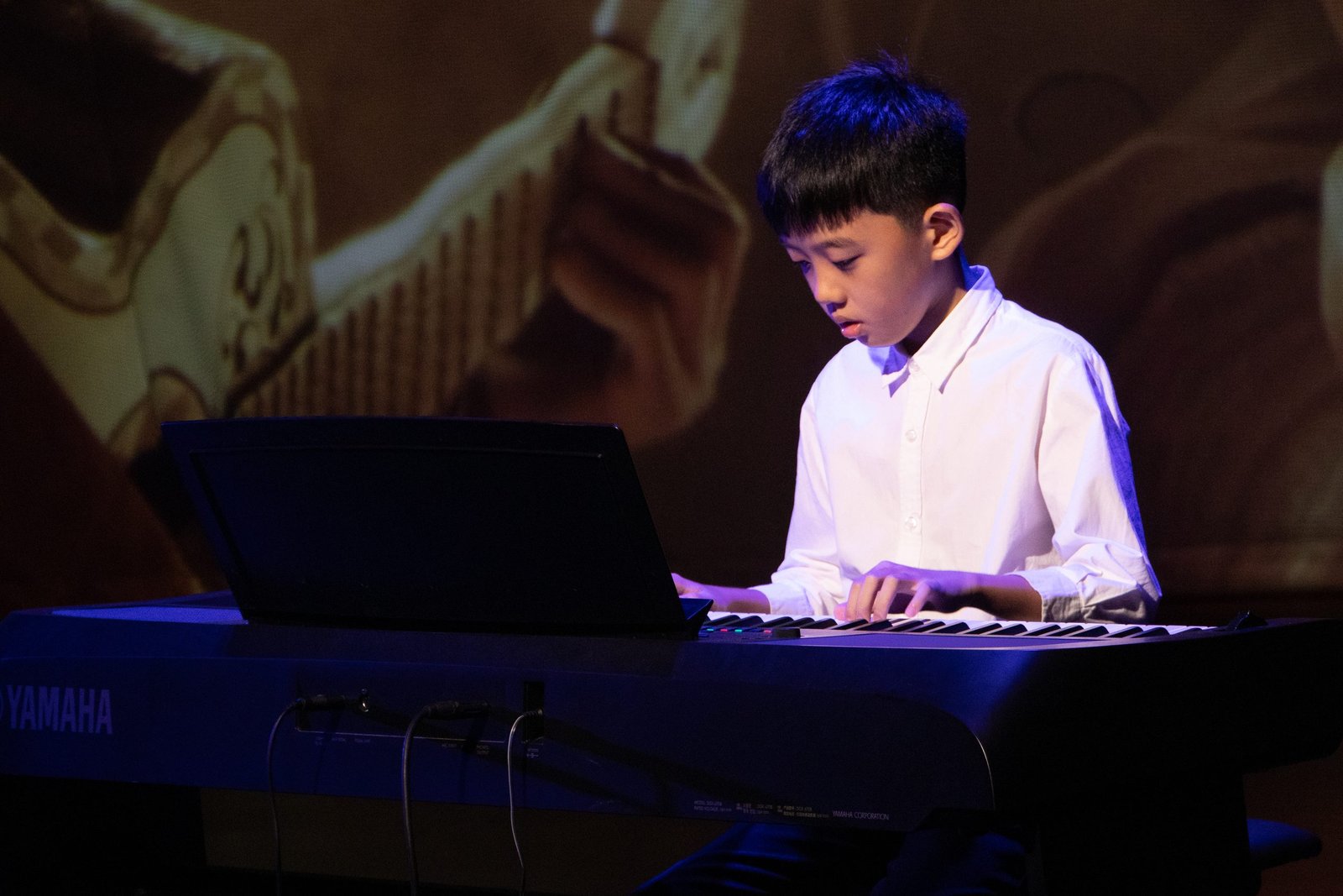 A student in a private instrument lesson at Octave.